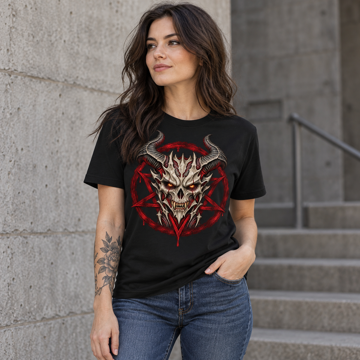 Female model wearing the Infernal Seal black T-shirt with ivory demon skull and red pentagram artwork.
