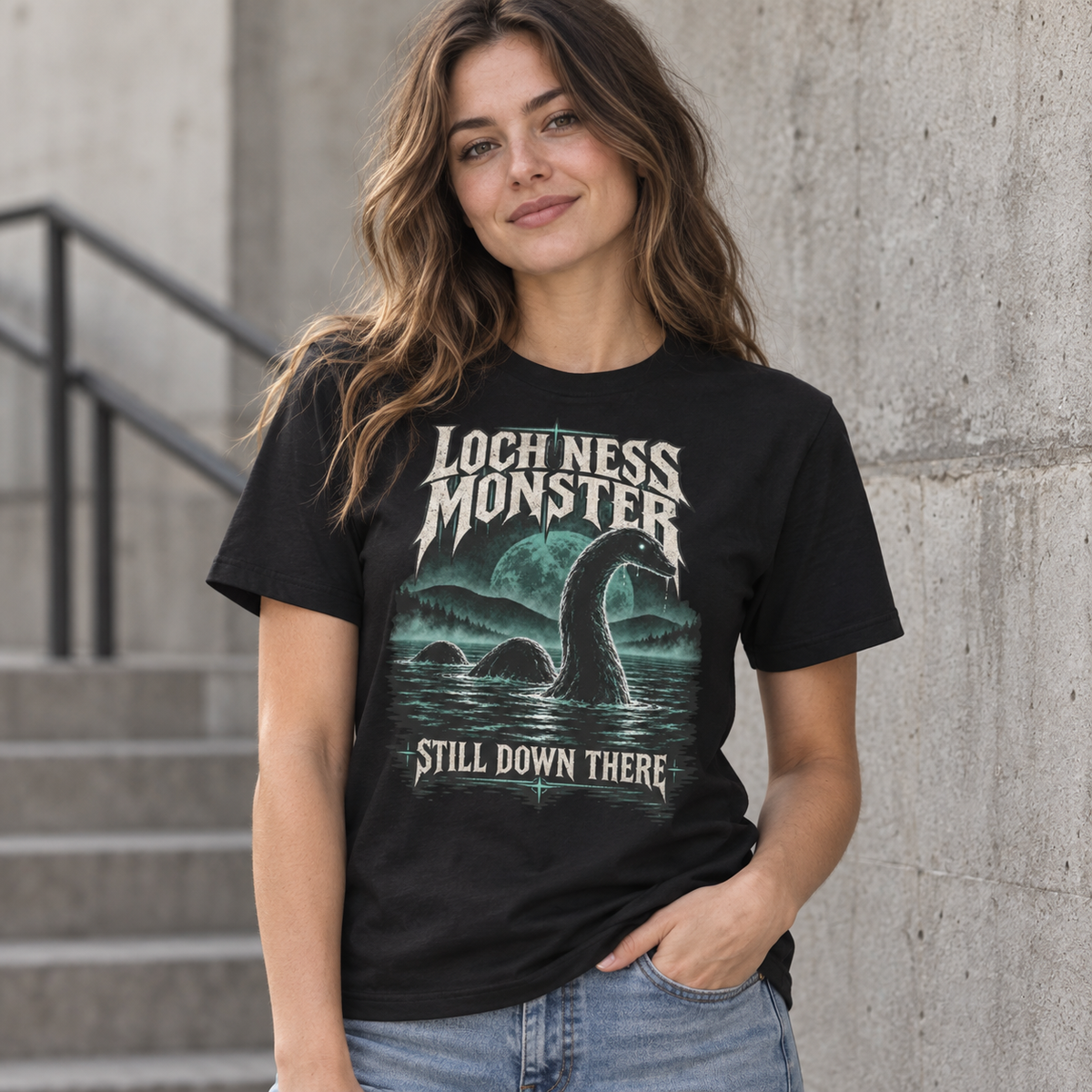 Loch Ness Monster Still Down There black cryptid graphic T-shirt lifestyle model view – Astral Drift